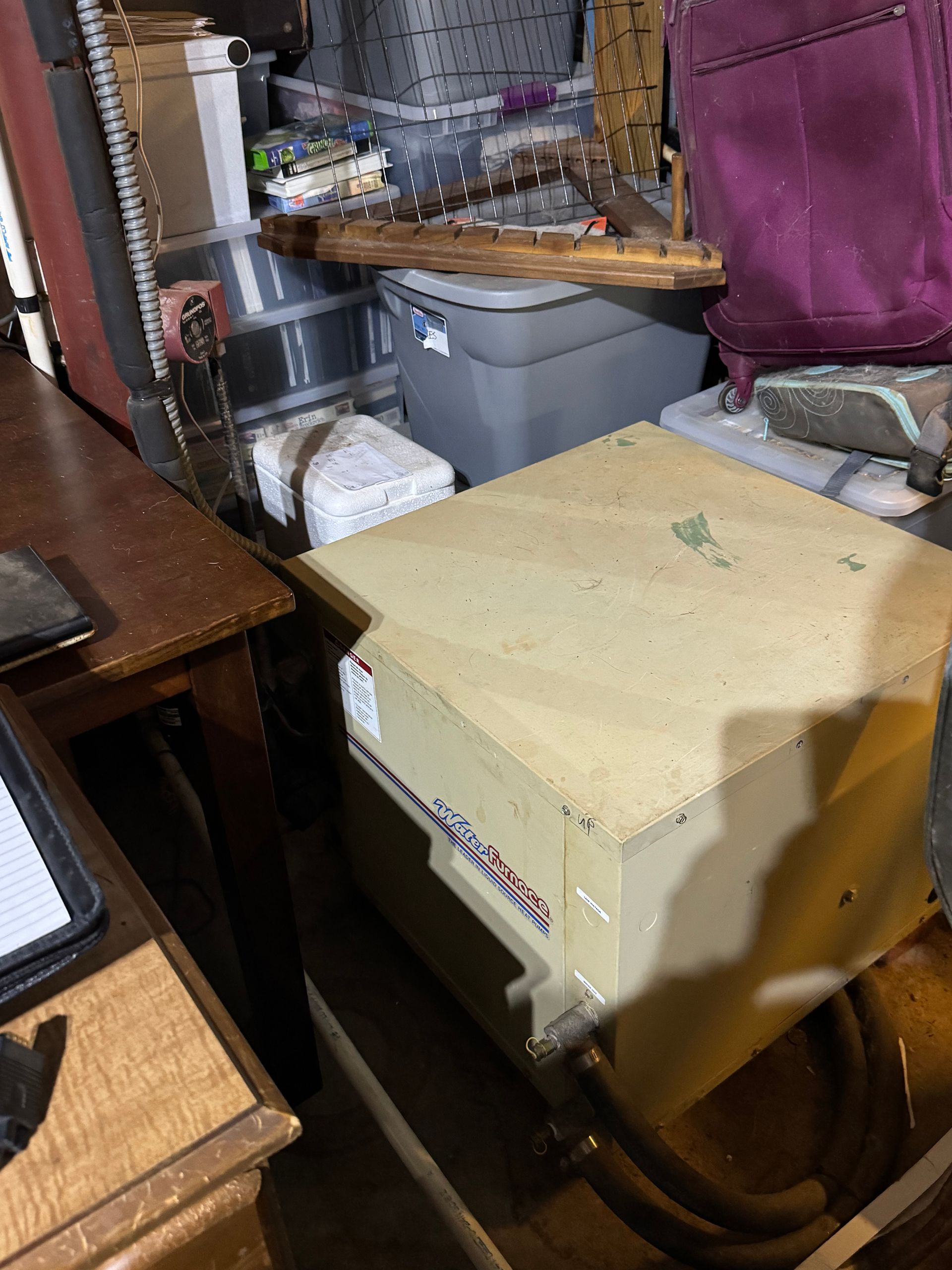 A bunch of boxes are sitting on top of a wooden table.