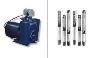 A blue jet pump on the left and a cluster of several cylindrical submersible pumps on the right.
