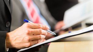 Learn More About Our Legal Services Man checking document