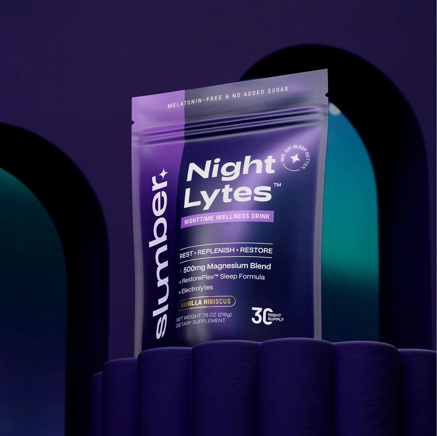 Bag of Slumber Night Lytes on a purple pedestal with blue, black, & purple background