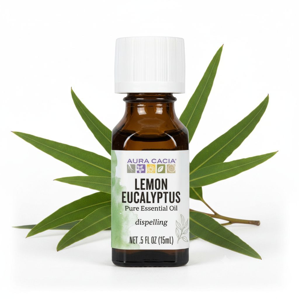 Aura Cacia Lemon Eucalyptus Essential Oil with lemon eucalyptus branch behind bottle