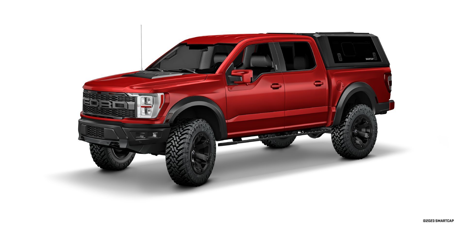 Red Ford Raptor pickup truck with black wheels and a black bed cap, on a white background.
