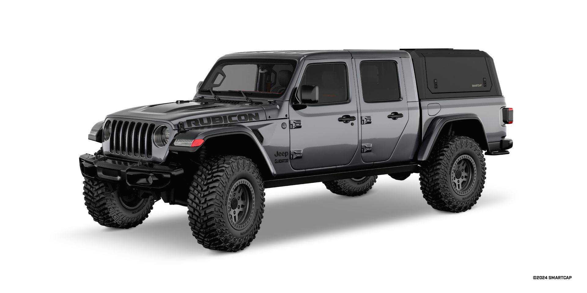 Gray Jeep Gladiator pickup truck with a black camper shell on a white background.