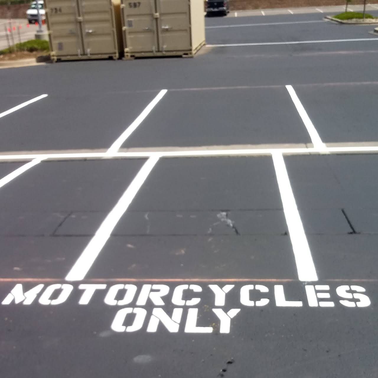 A parking lot with motorcycles only written on it