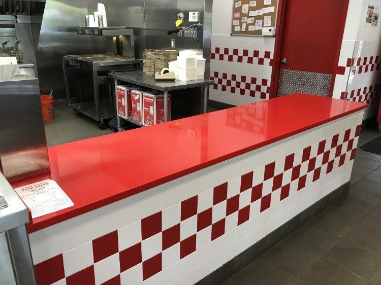 A red and white checkered counter in a restaurant