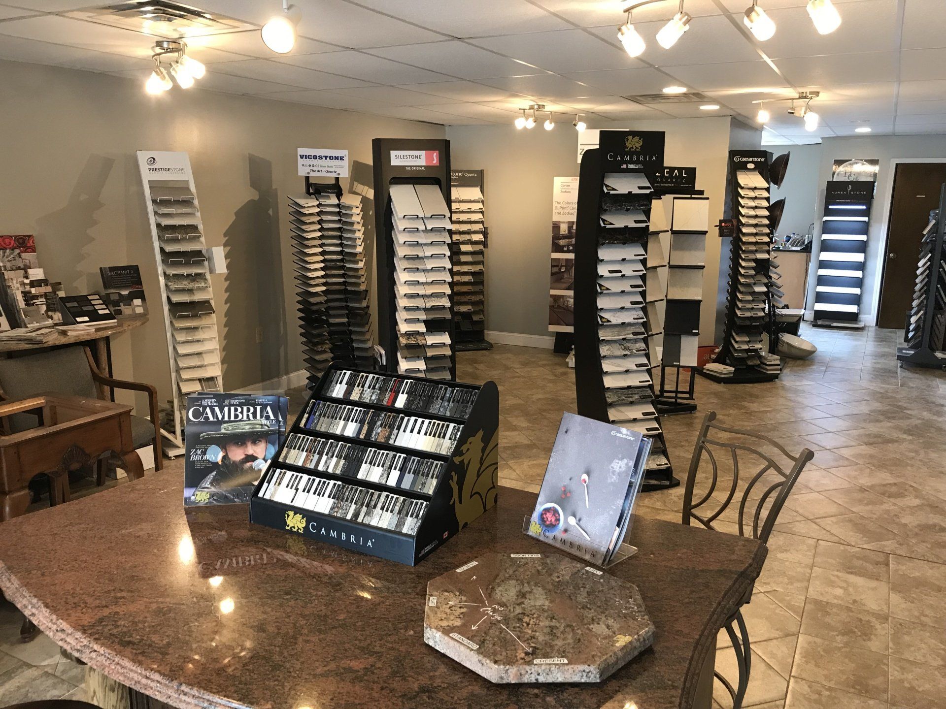 A store filled with lots of displays and a table.