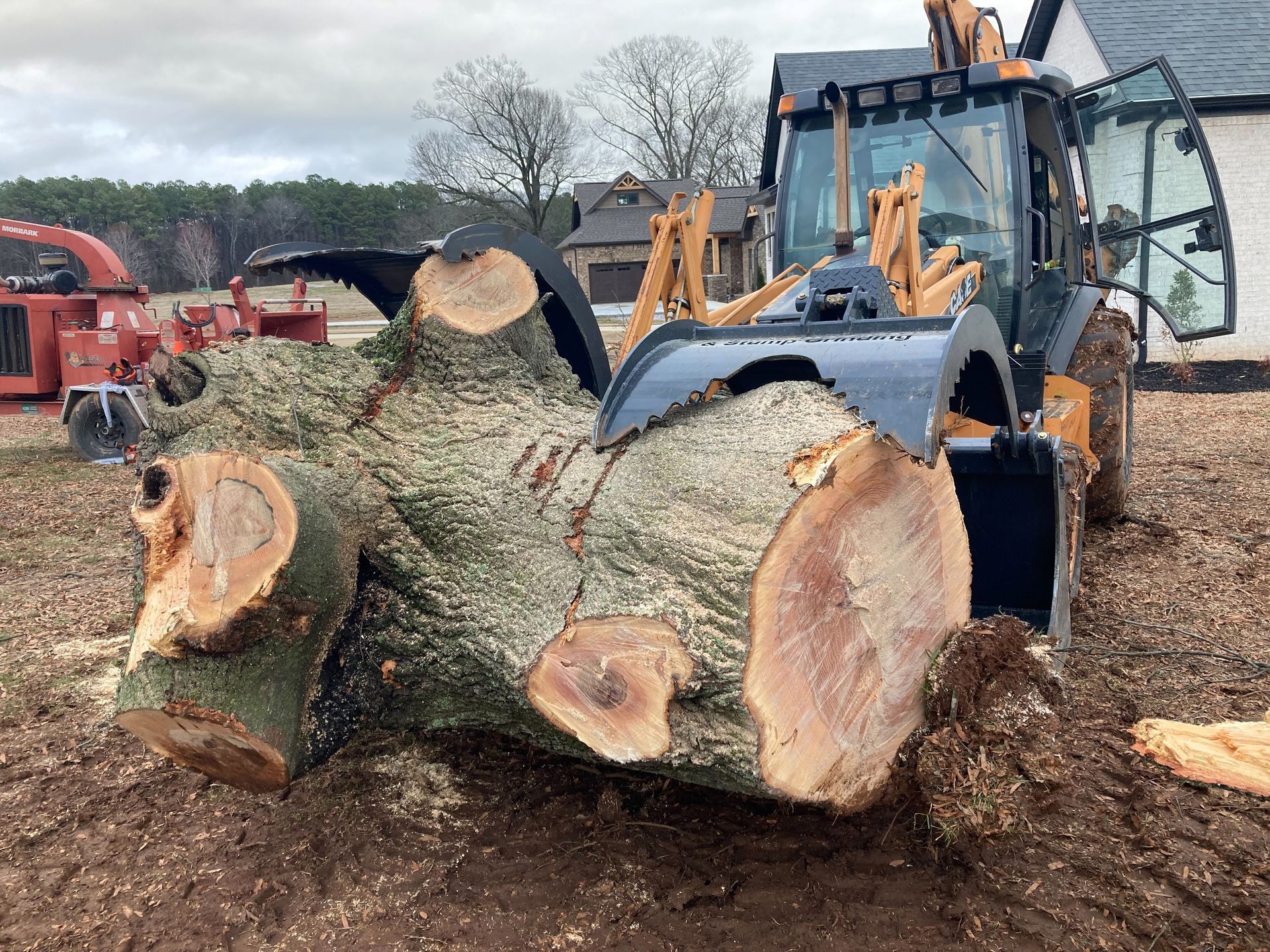 loader picked up stump