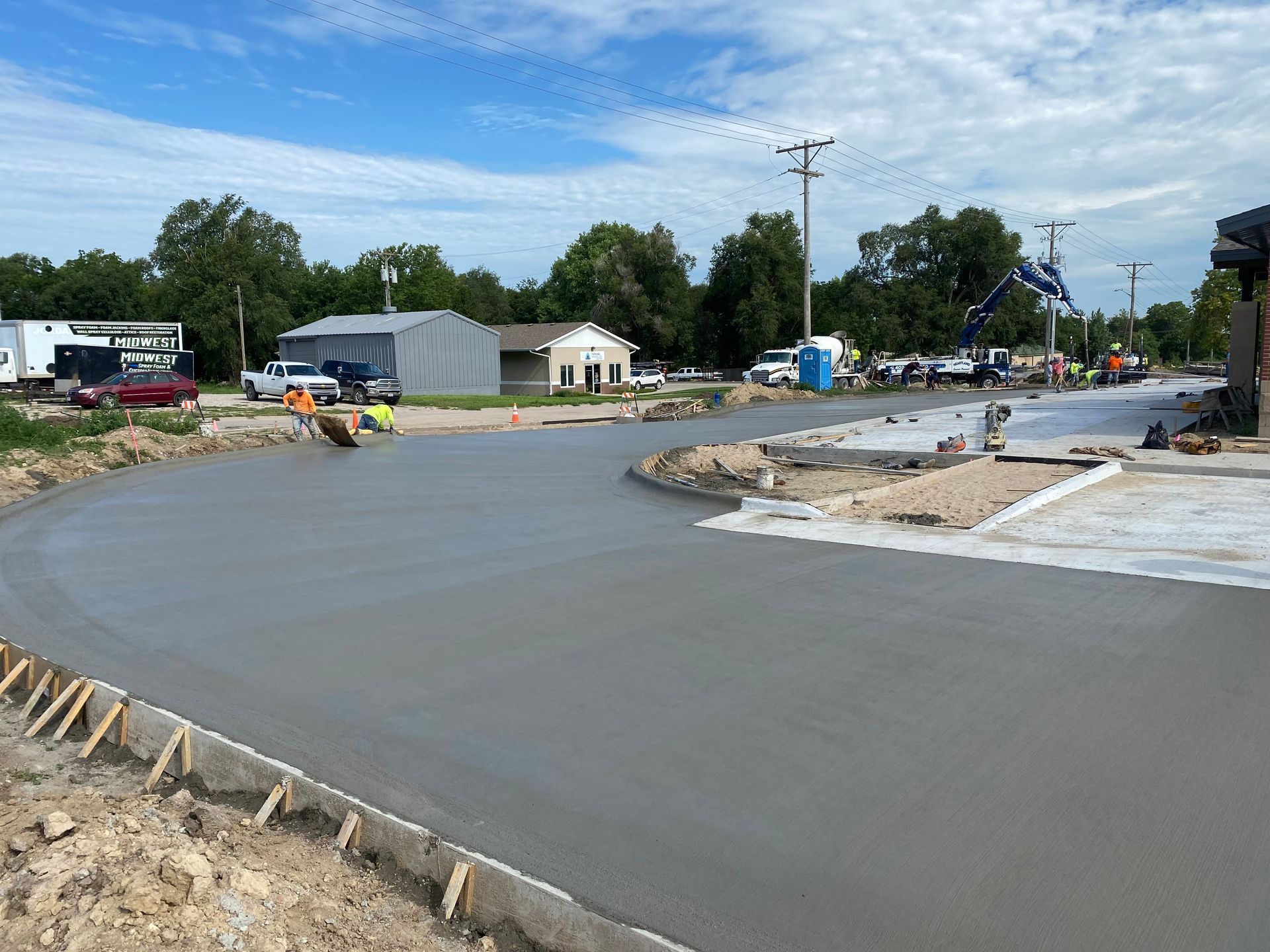 A concrete driveway is being built