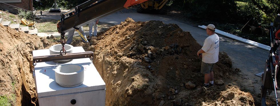 A septic tank is being installed under the ground