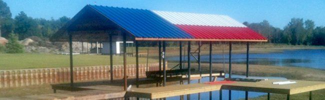 Custom boat dock with metal roofing