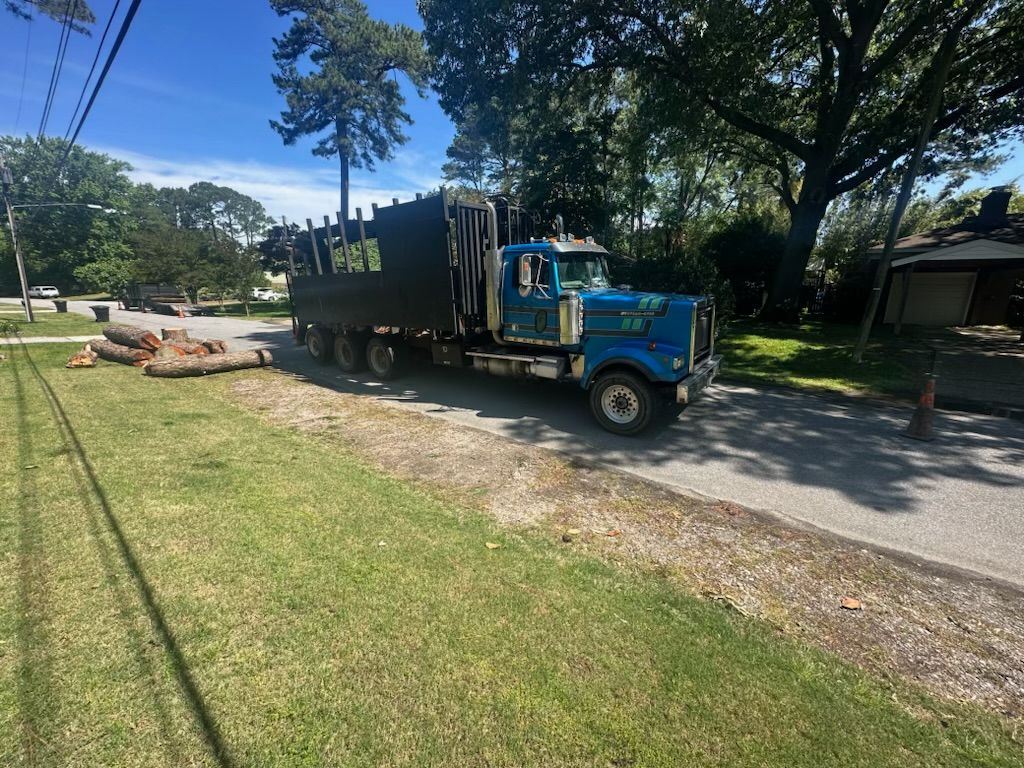 Poor Folks Tree Service blue truck