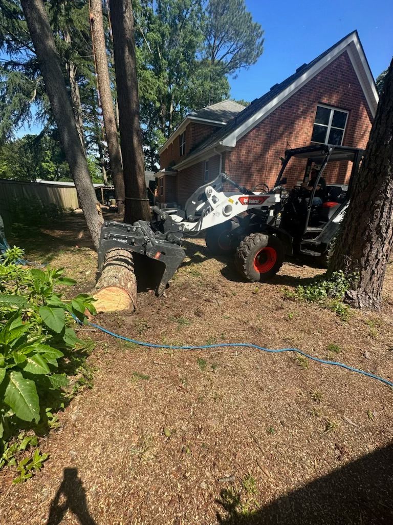 Poor Folks Tree Service's small white truck