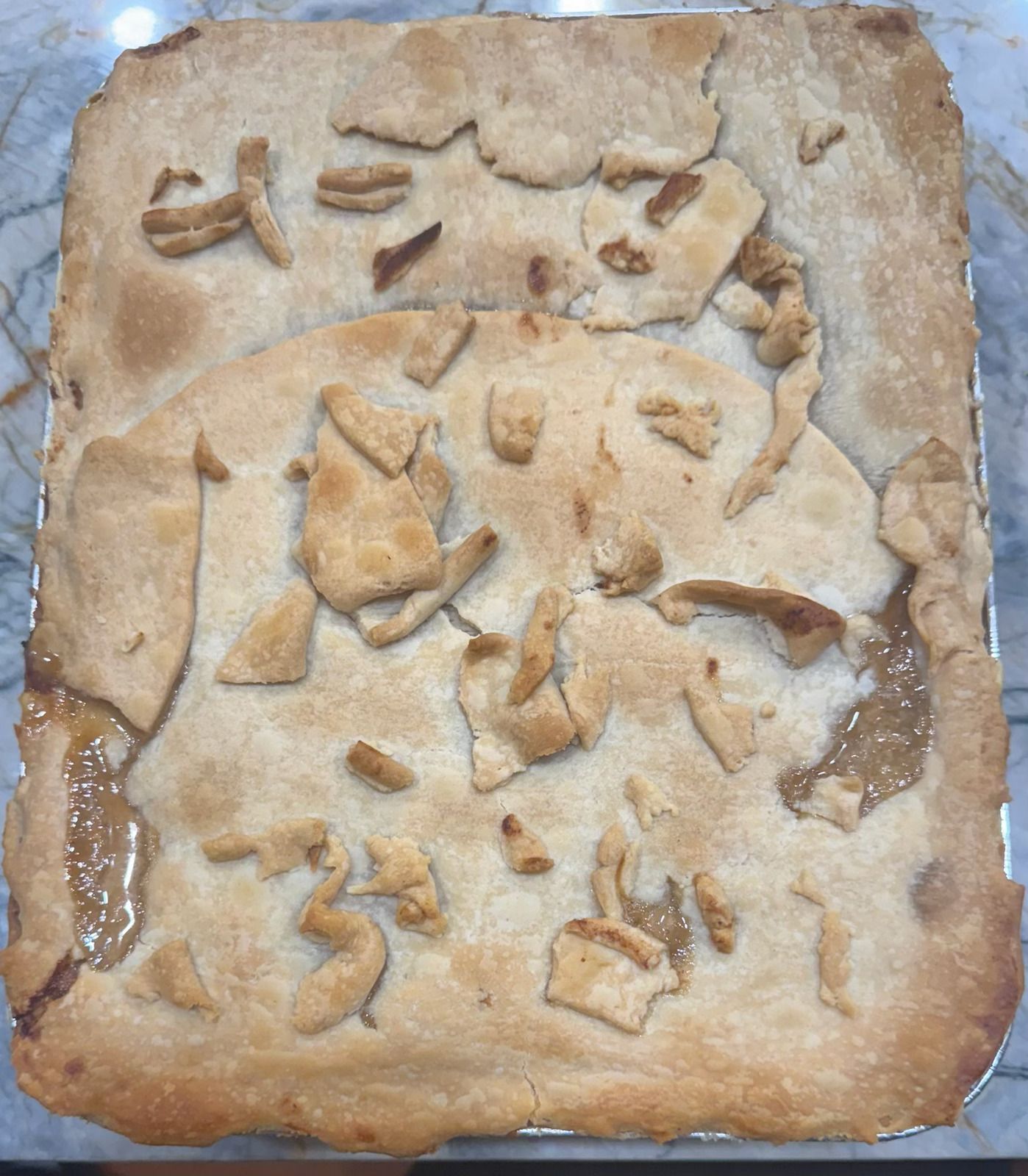 A pie with a lot of crumbs on it