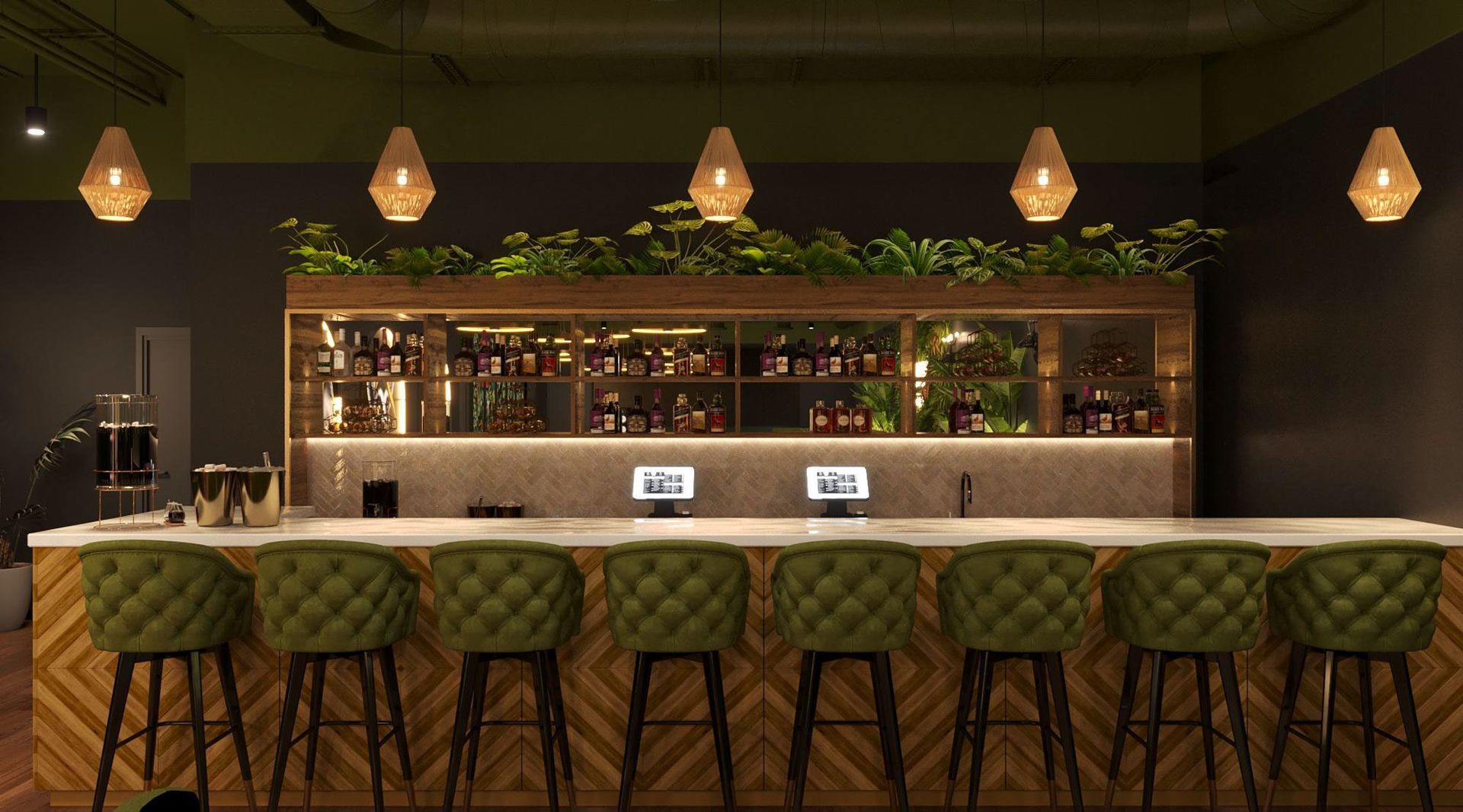 A bar with a long counter and green stools in a restaurant.