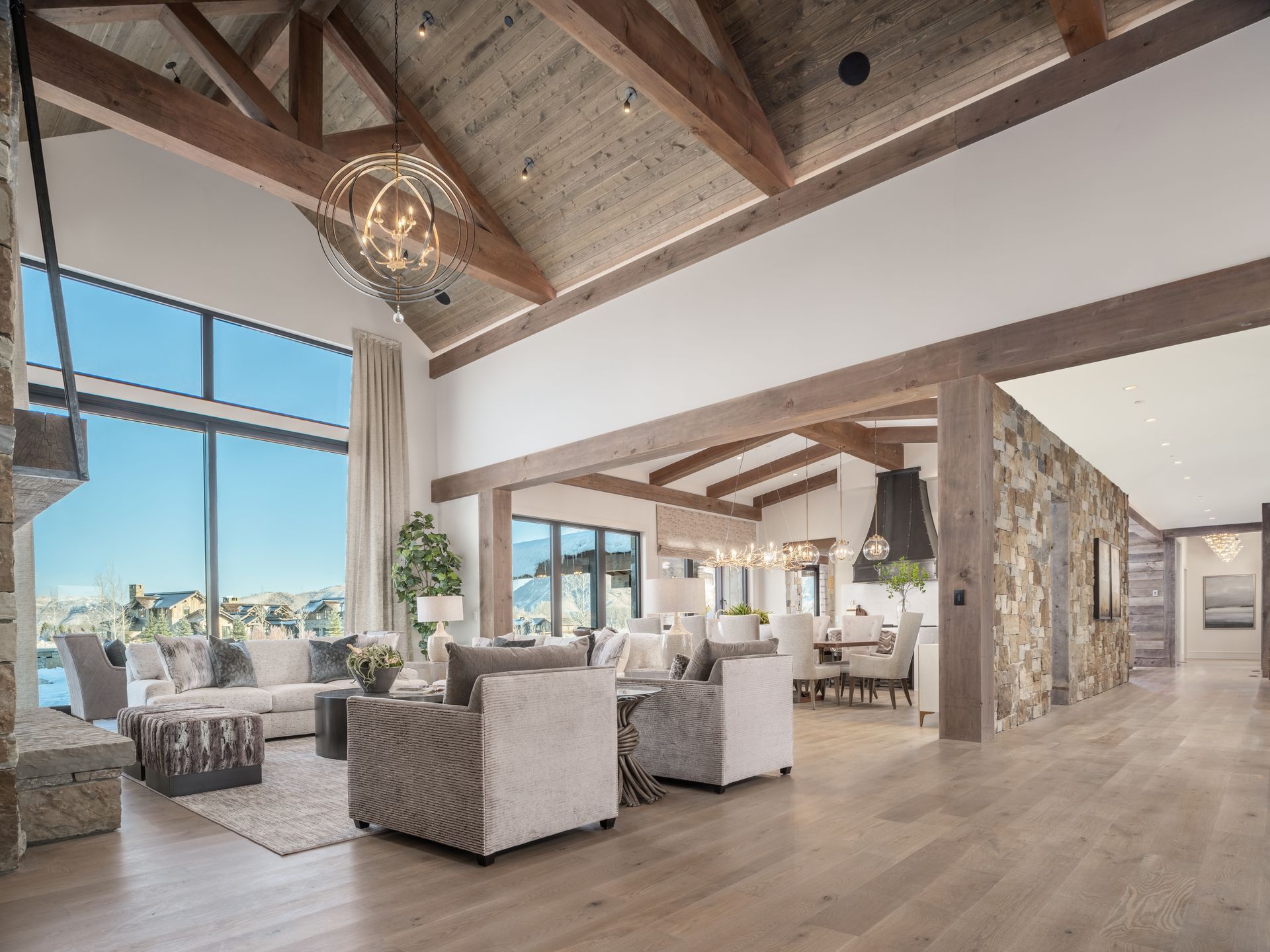A living room with a lot of furniture and a fireplace.