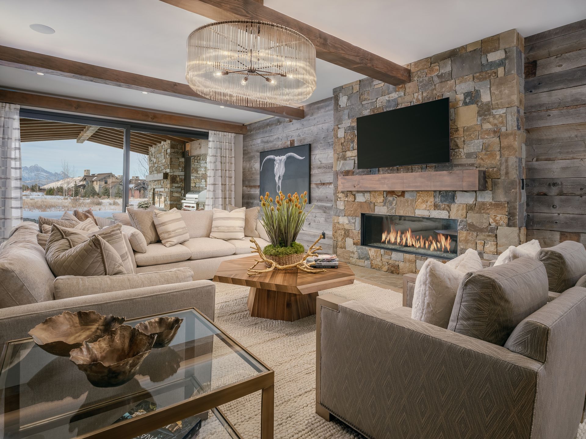 A living room with a fireplace and a flat screen tv.