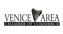 Venice Area Chamber of Commerce logo: Text with a shark tooth in place of the 
