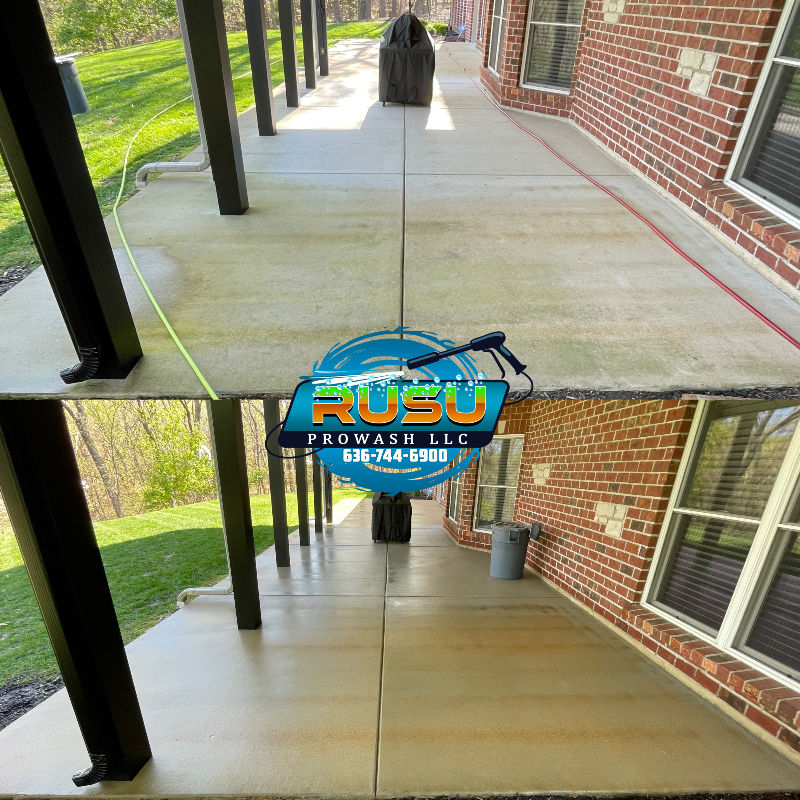 A before and after photo of a concrete porch being cleaned by prowash llc.