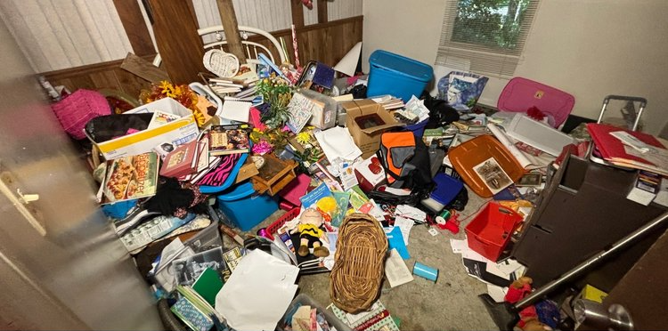 A room filled with lots of junk and toys.
