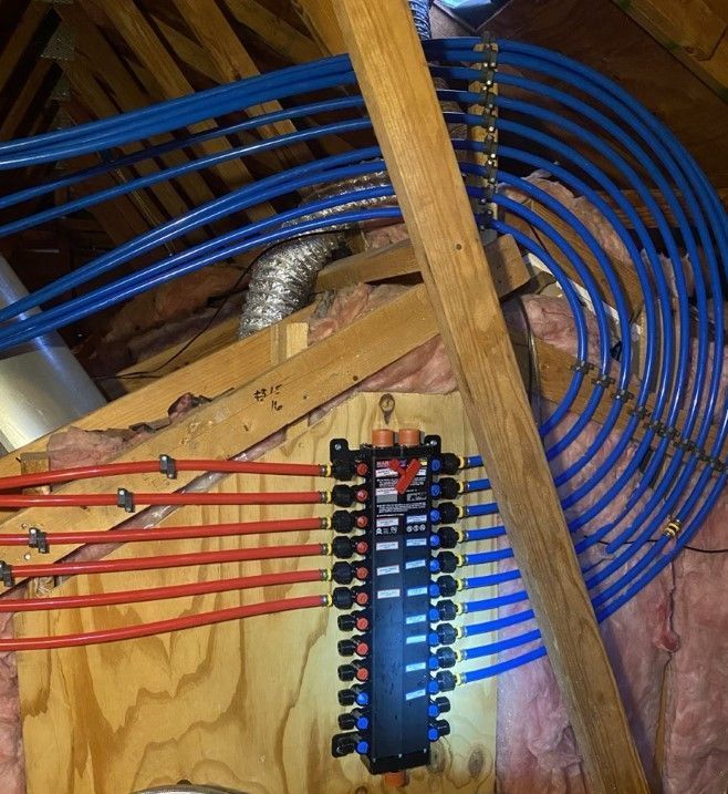 A bunch of wires are connected to a wooden box
