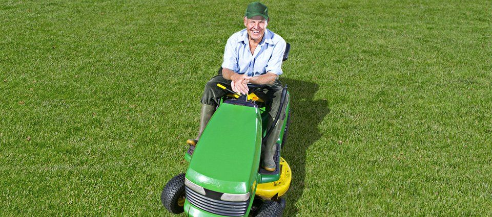 Man on lawn mower