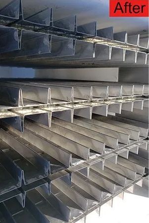 Close-up of a stacked metal structure with many horizontal and vertical supports. 