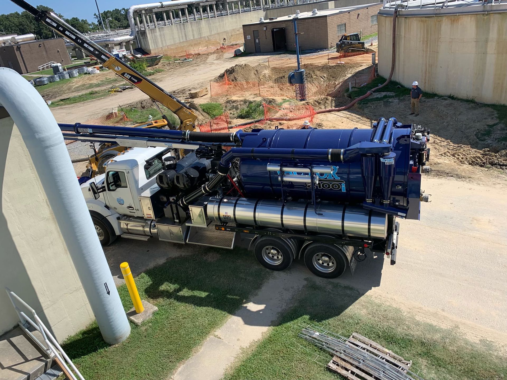 Blue vactor truck