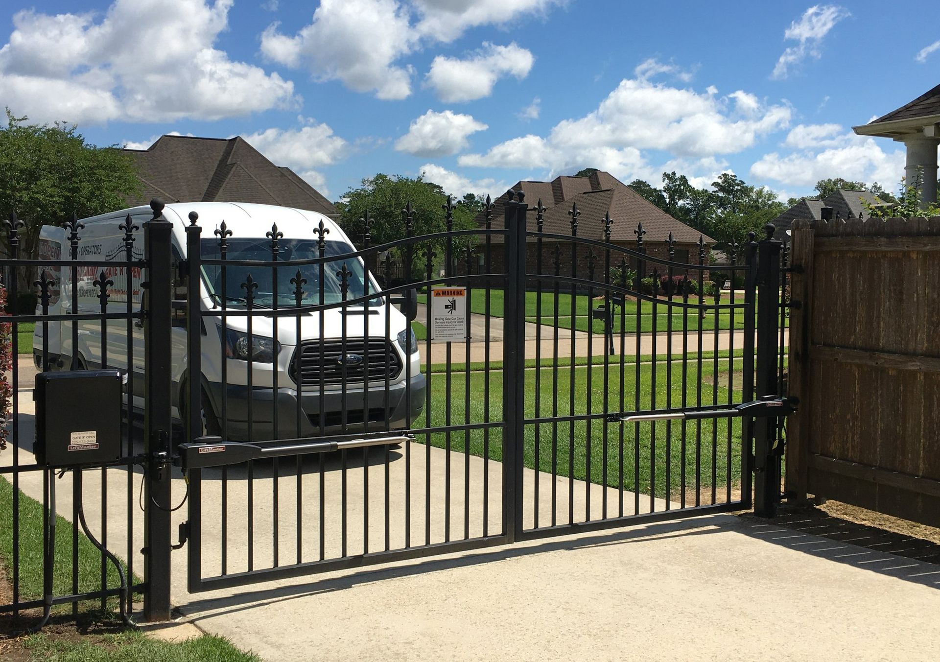 Custom iron gate with automated gate system