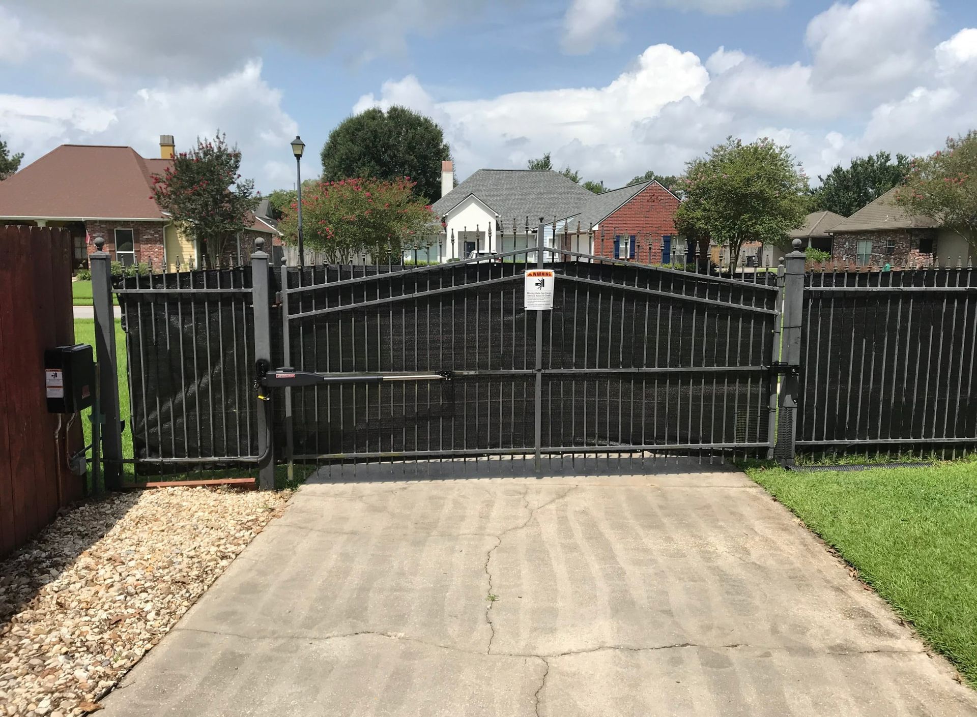 Custom iron gate with automated gate system