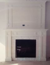 There is a fireplace in the middle of the room.