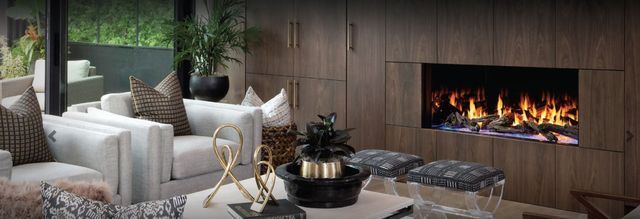 A living room filled with furniture and a fireplace.