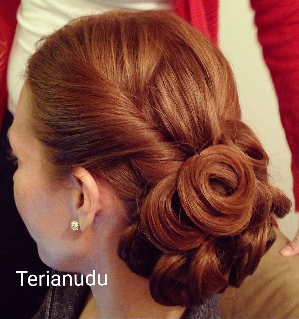 A close-up of a woman's hair with the name Terianudu on the bottom