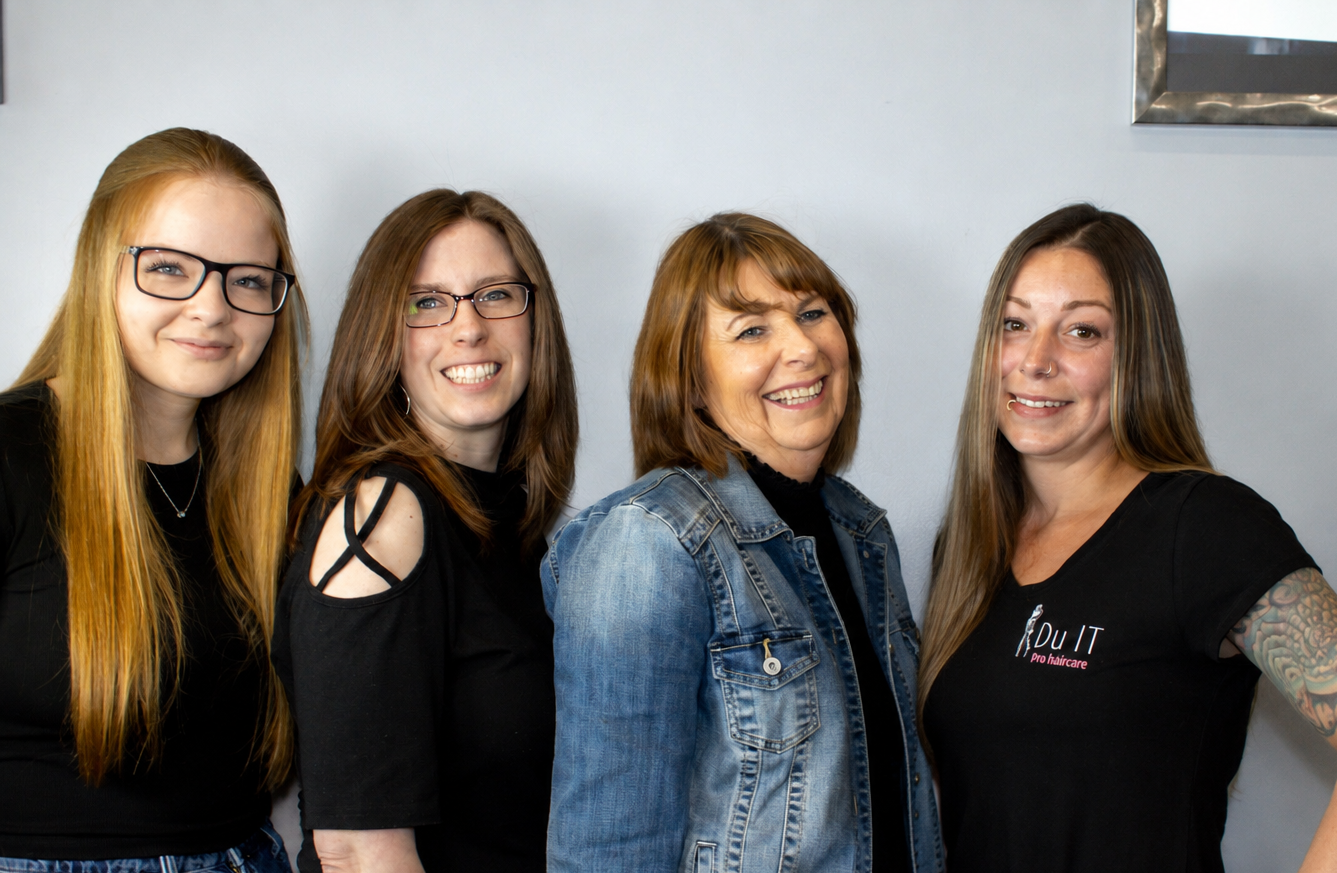 A group of women are posing for a picture together.