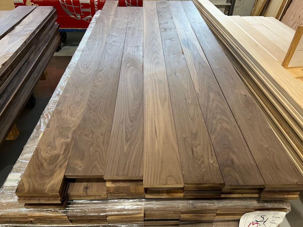 A stack of wooden boards sitting on top of each other