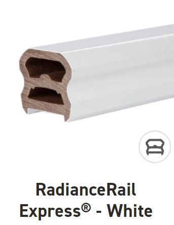 A white railing with the words radiance rail express written on it.