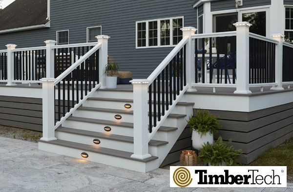 A deck with stairs and a timbertech logo