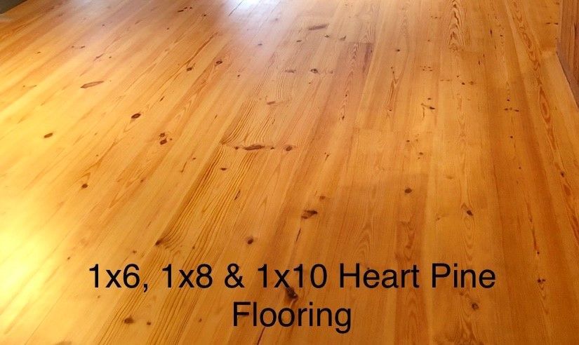 A wooden floor with the words 1x6 , 1x8 & 1x10 heart pine flooring written on it.