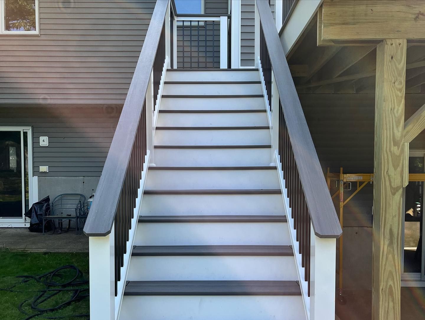 A set of stairs leading up to the second floor of a house.