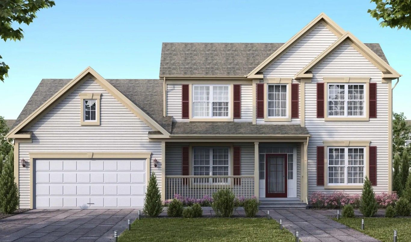 Two-story suburban house with gray siding, red shutters, and a double garage under a blue sky
