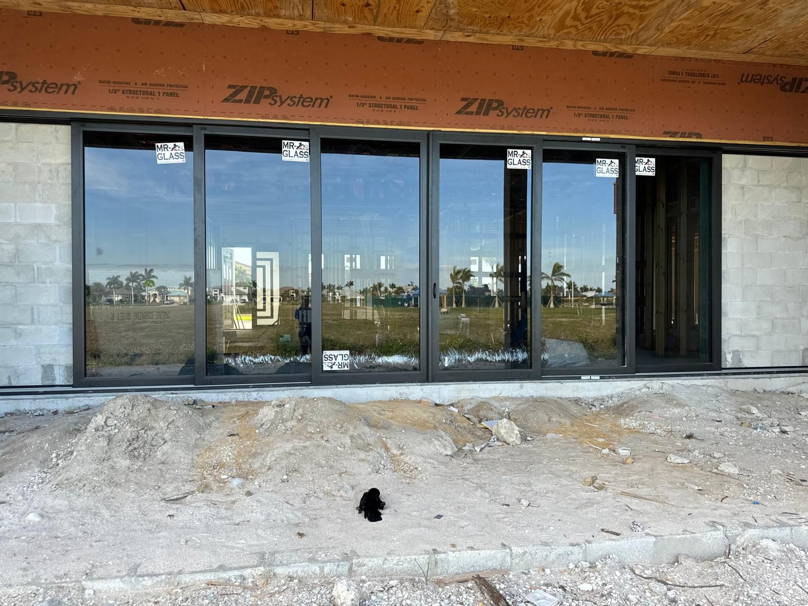 A building under construction with a lot of windows