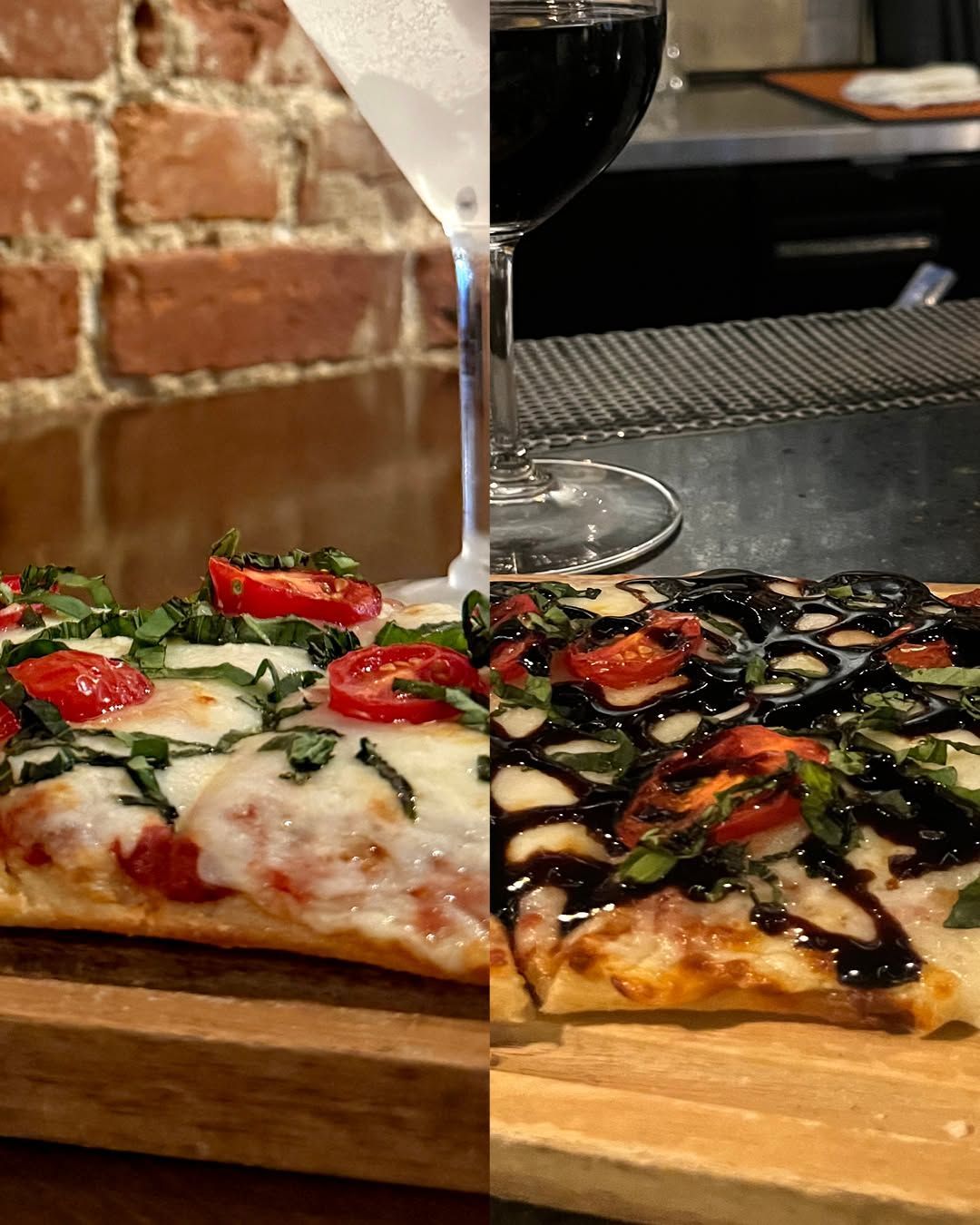 Two pizza slices on a wooden board, one margherita and one drizzled with dark sauce, beside a wine glass