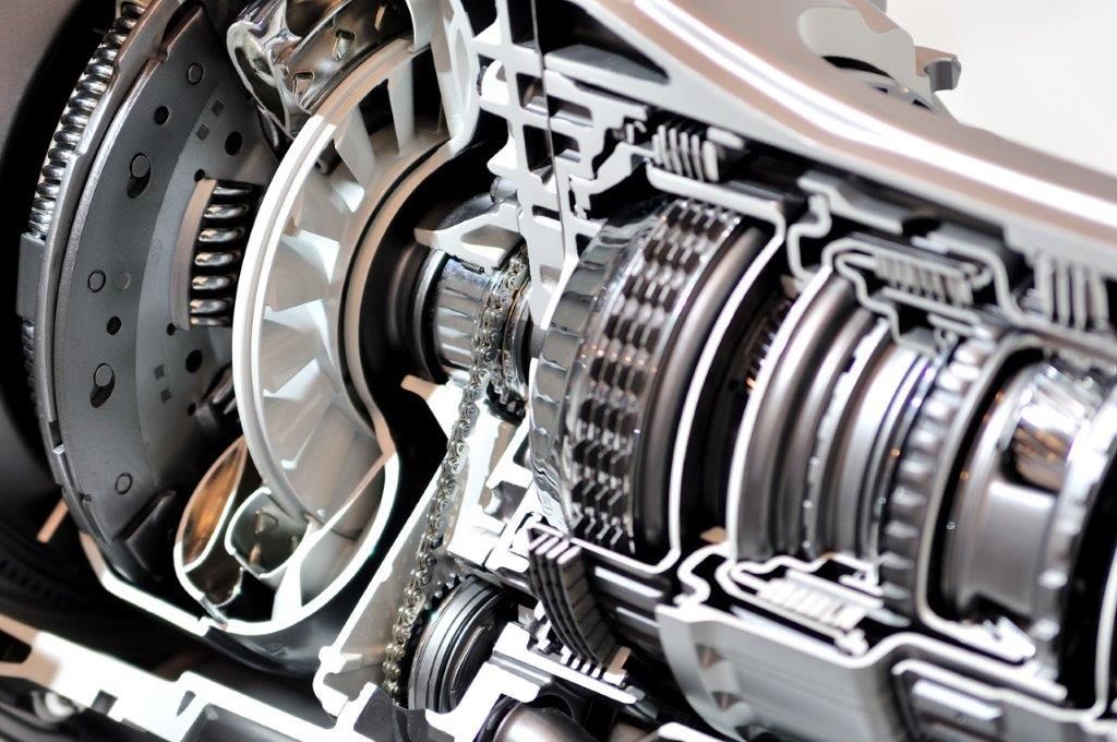 Cross-section of an automatic transmission, revealing gears, clutch plates, and a torque converter.