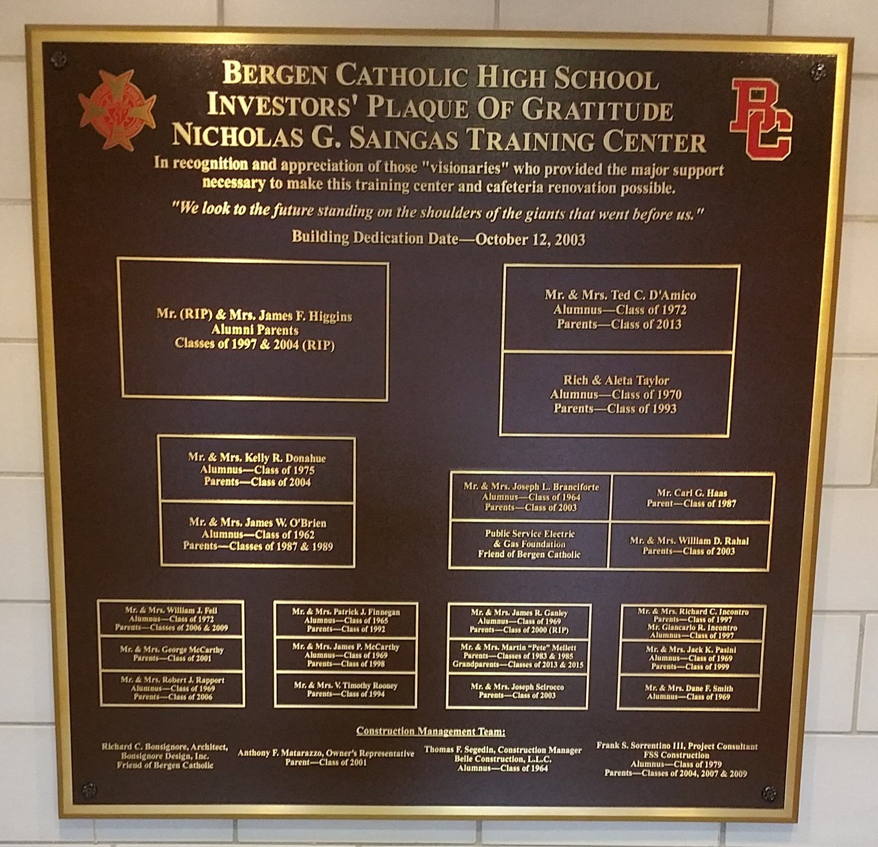 Plaque at Bergen Catholic High School for investors, brown with gold lettering and trim