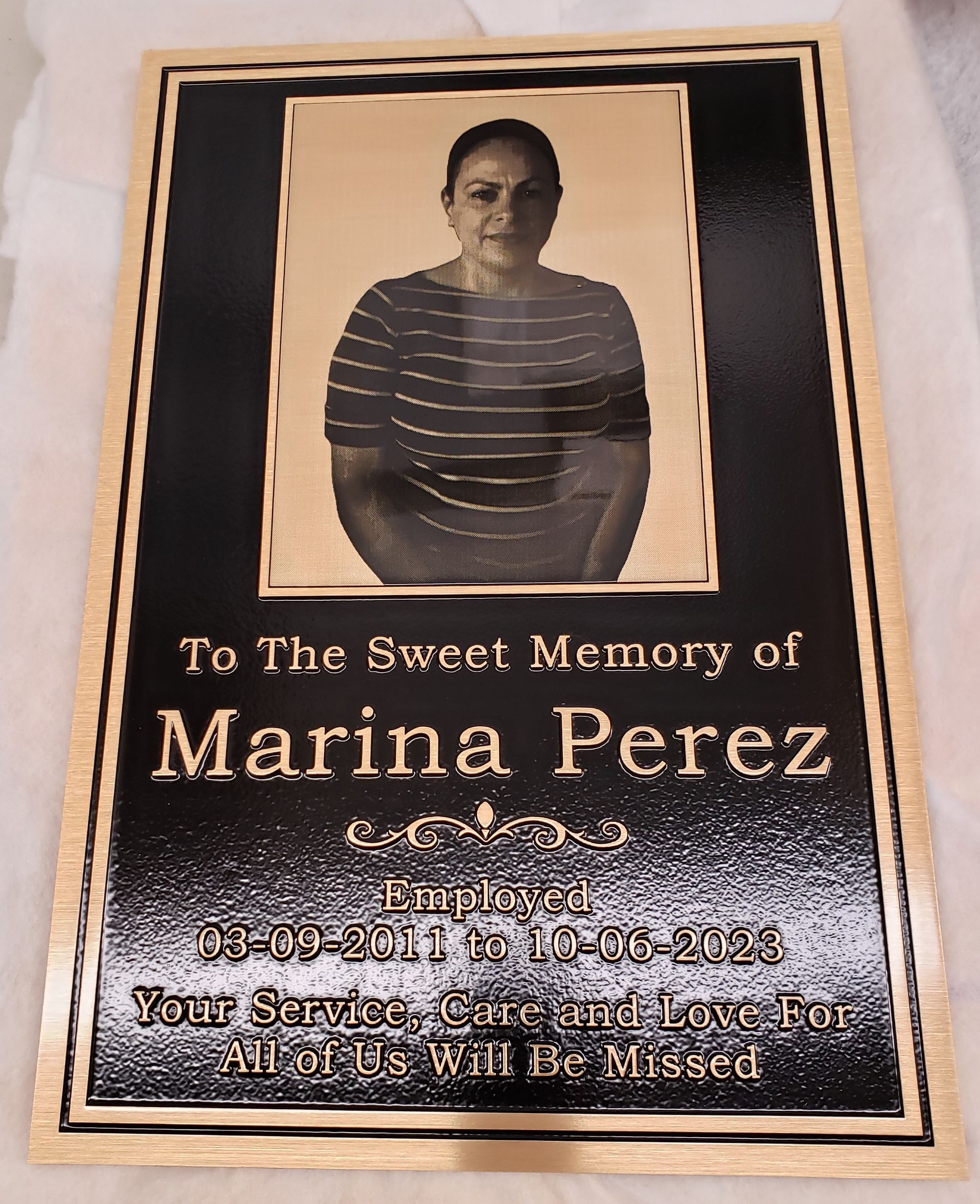 Plaque with photo of Marina Perez