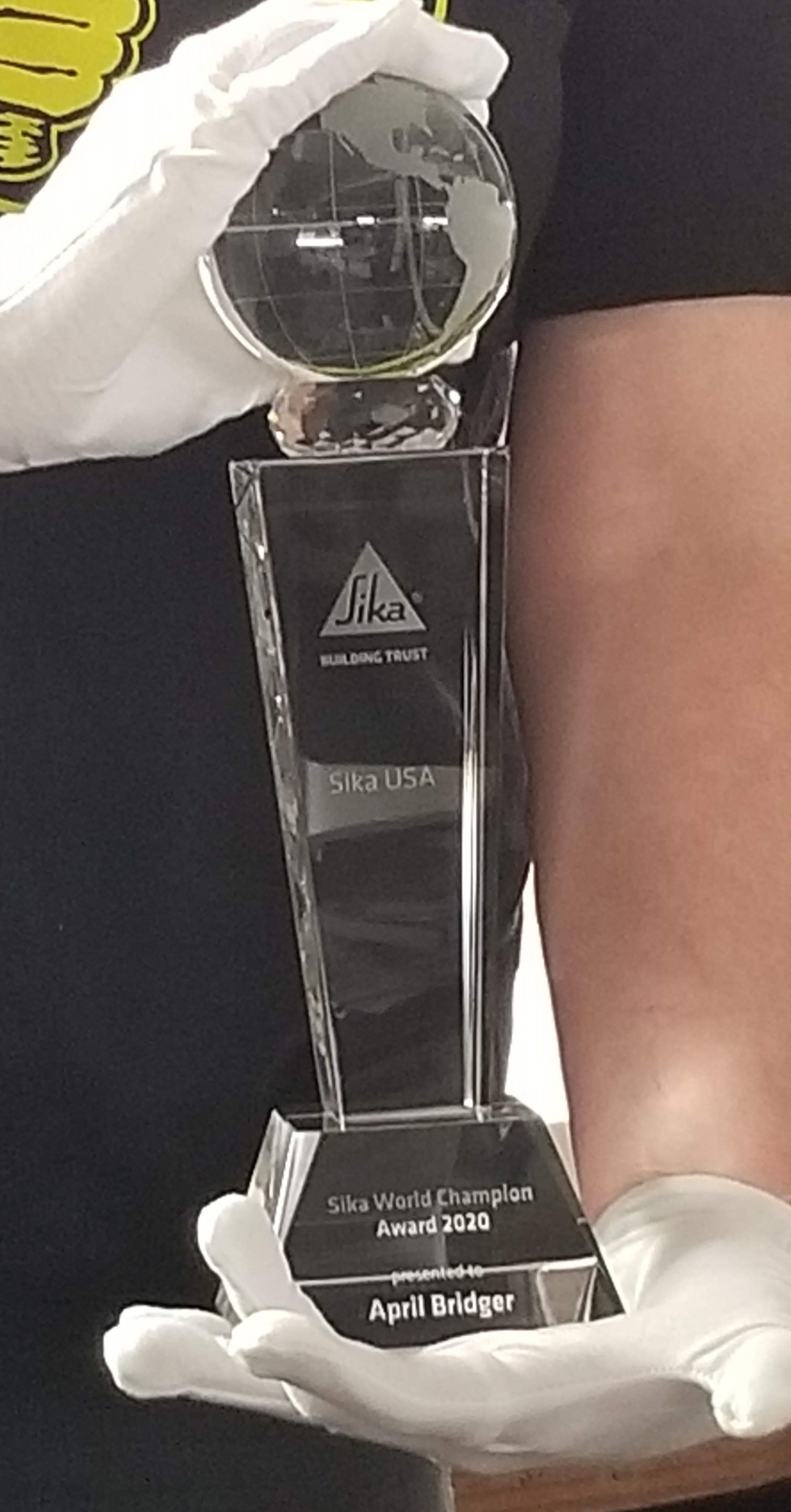 Person holding an award