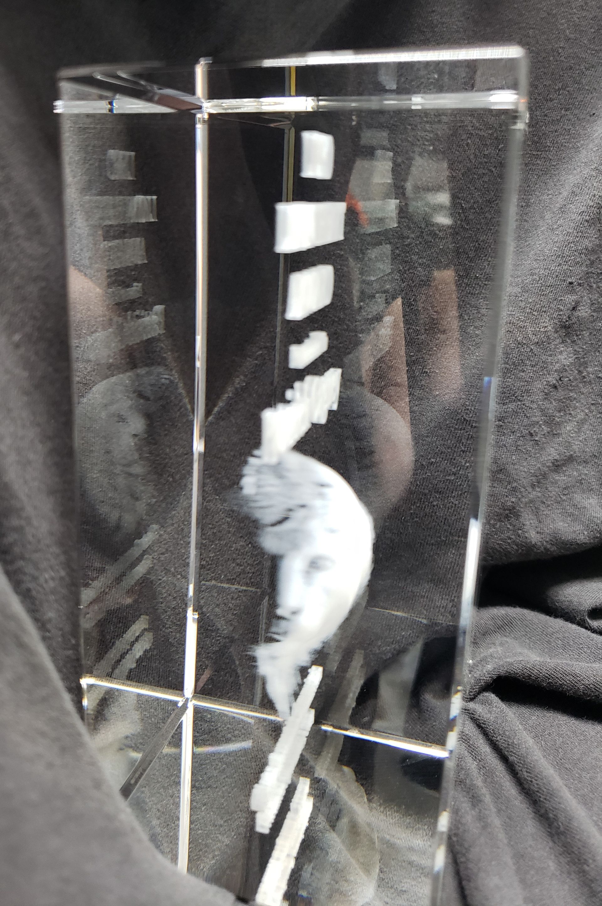 Clear crystal block with etched white abstract design