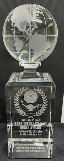 Crystal trophy with a globe on top