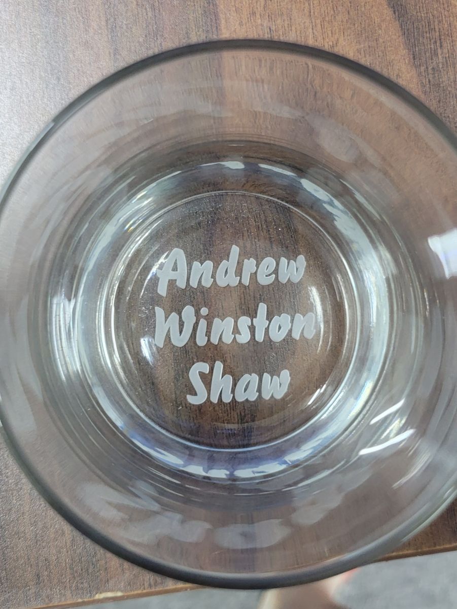 Glass bottom etched with 