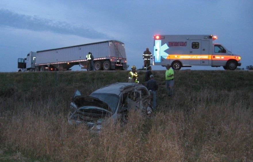 Truck crash injury attorneys collecting evidence.