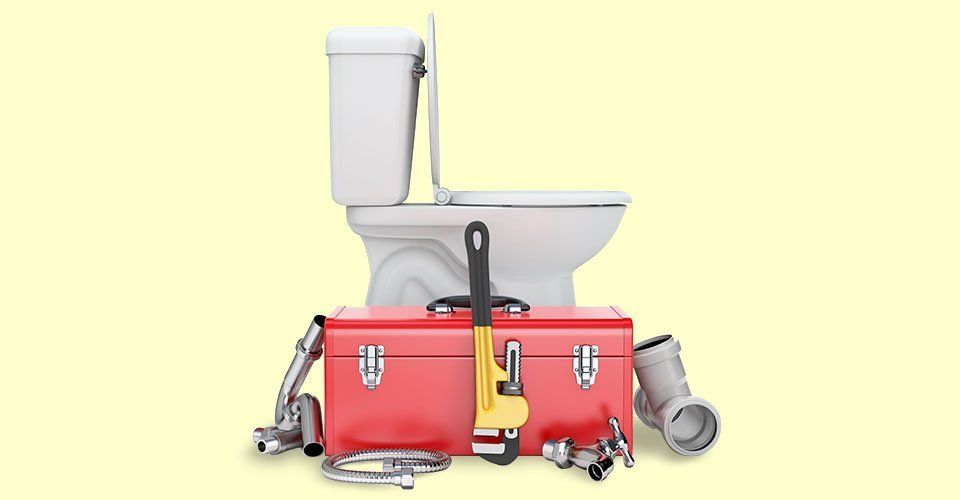 Plumbing tools and toilet bowl